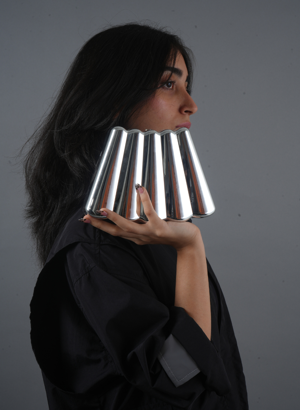 Sculpted Chrome Clutch