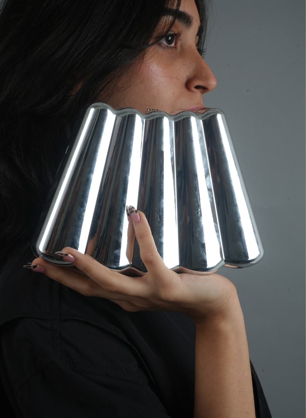 Sculpted Chrome Clutch